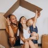 Young family with little daughter moving into new house